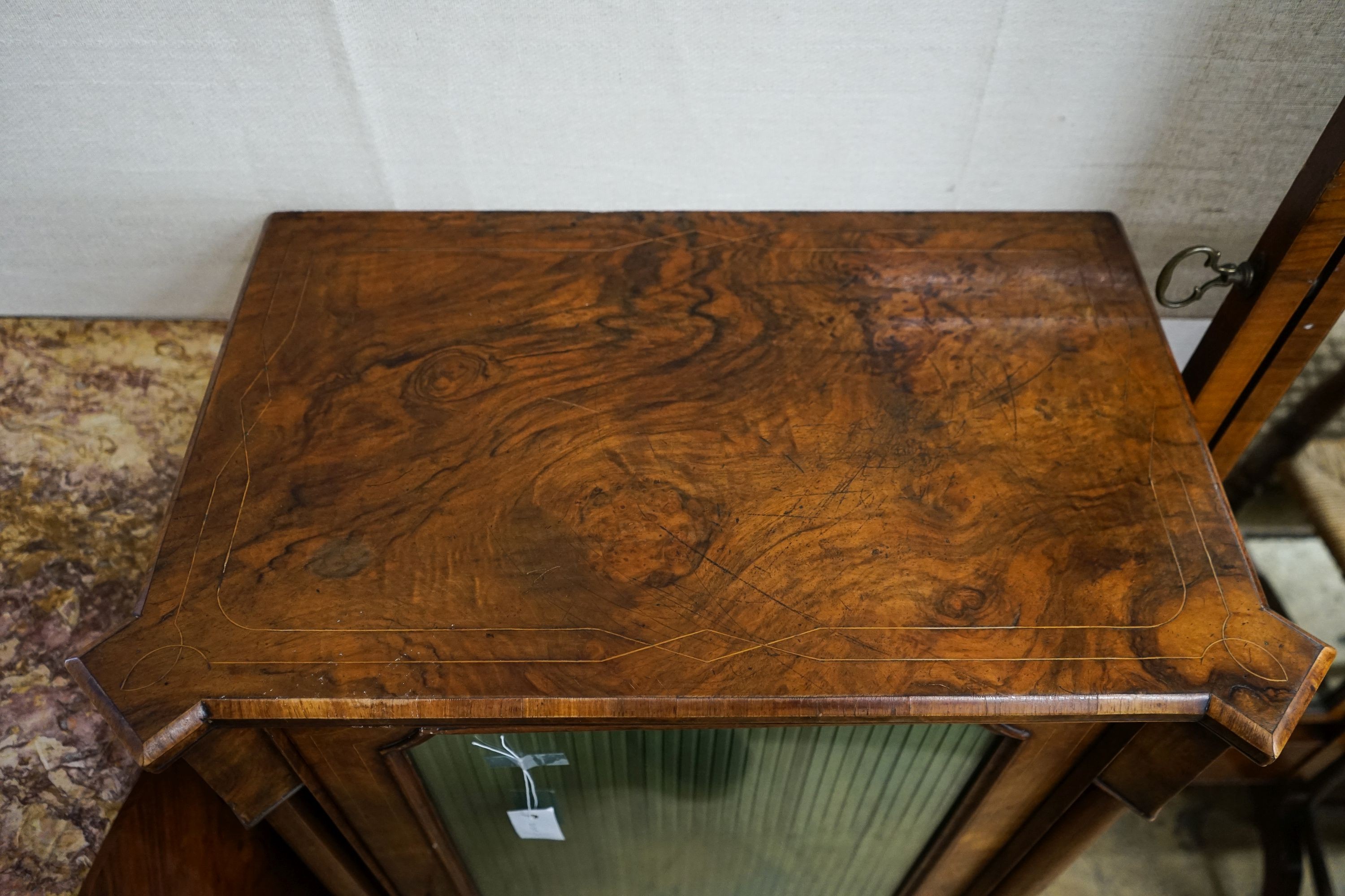 A Victorian figured walnut music cabinet, width 67cm, depth 40cm, height 100cm